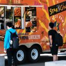 Customers waiting at food truck.